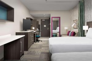 Postel nebo postele na pokoji v ubytování Home2 Suites by Hilton Denver Central Park