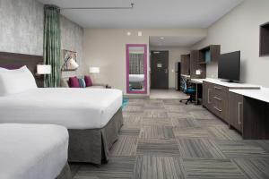 Postel nebo postele na pokoji v ubytování Home2 Suites by Hilton Denver Central Park
