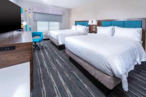 Hampton Inn & Suites Conway, Ar客房内的一张或多张床位