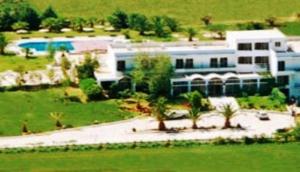 A garden outside Rhodian Sun Hotel