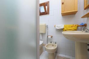 Koupelna v ubytování Villetta Meyer Lu Pitrali