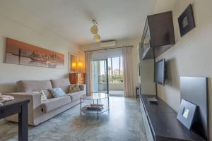 Posezení v ubytování Natera Costa Golf Exclusive Beachfront Apartment