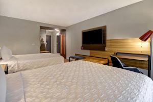 Postel nebo postele na pokoji v ubytování Tru By Hilton Rockwall Dallas, Tx