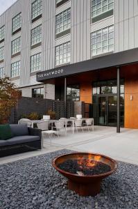 a fire pit in front of a building at The Haywood, Tapestry Collection by Hilton in El Dorado