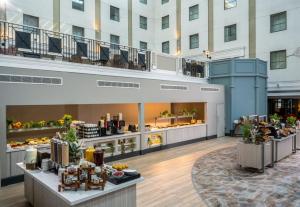 a view of the lobby of a hotel at Leonardo Royal Hotel Brighton Waterfront in Brighton & Hove