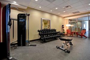 a room with a gym with a lot of exercise equipment at Home2 Suites By Hilton Odessa in Odessa