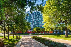 a park with a building in the background at Homewood Suites by Hilton Boston Seaport District in Boston