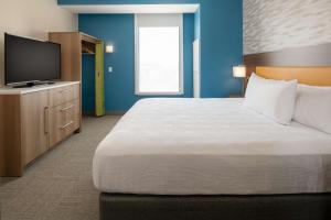 Home2 Suites By Hilton Boise Downtown客房内的一张或多张床位