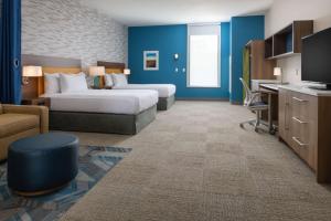 Home2 Suites By Hilton Boise Downtown客房内的一张或多张床位
