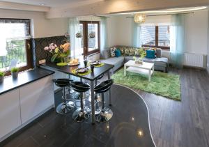Posedenie v ubytovaní VIP Apartamenty Widokowe