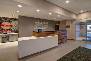 a welcome desk in a lobby of a fast food restaurant at Hampton Inn Brockville, On in Brockville