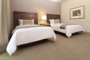 Letto o letti in una camera di MS Milenium Monterrey Curio Collection by Hilton