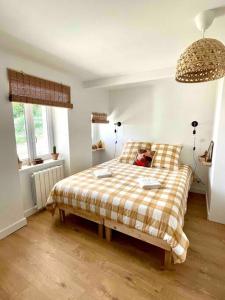 Postel nebo postele na pokoji v ubytování Villa Martha - Appt 01