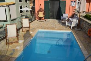The swimming pool at or close to Villa Thetis with private pool where the sunsets fade away