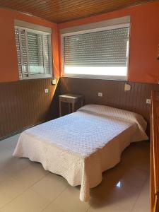Posteľ alebo postele v izbe v ubytovaní Bajo diáfano con cocina y baño