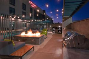 a fire pit in the middle of a patio at Hampton Inn Riverside March Air Force Base, Ca in Riverside