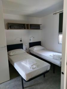 Postel nebo postele na pokoji v ubytování Camping Taimì