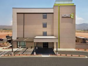 a building with a home sign on it at Home2 Suites By Hilton Alamogordo White Sands in Alamogordo