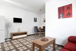 TV a/nebo společenská místnost v ubytování Complejo Casas Cala del Aceite