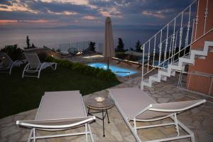 The swimming pool at or close to Villa Thetis with private pool where the sunsets fade away