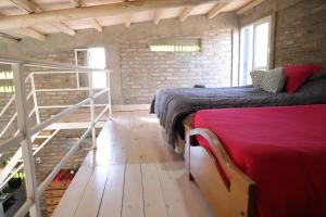 Voodi või voodid majutusasutuse Casa Cubo toas