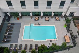 an overhead view of a swimming pool in a building at Home2 Suites by Hilton Houston Medical Center, TX in Houston