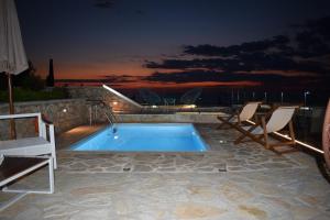 The swimming pool at or close to Villa Thetis with private pool where the sunsets fade away
