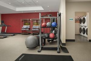 a gym with a bunch of balls on a shelf at Home2 Suites By Hilton Kenner New Orleans Arpt in Kenner
