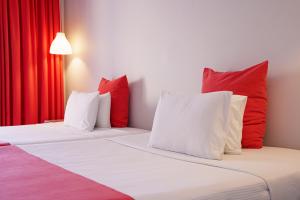 Voodi või voodid majutusasutuse Filoxenia Hotel Zakynthos toas