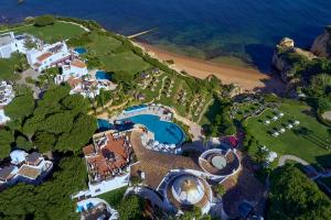 an aerial view of a resort near the ocean at Vila Vita Parc Resort & Spa in Armação de Pêra