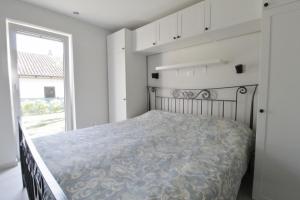 Postel nebo postele na pokoji v ubytování Holiday house Andreja