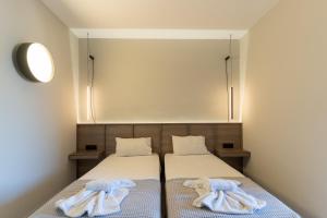 Voodi või voodid majutusasutuse Hera Zakynthos Hotel toas