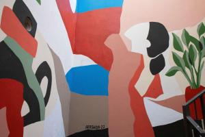 a mural on the side of a wall at Se Catedral Hotel Porto, Tapestry Collection By Hilton in Porto