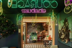 a restaurant with a sign that reads elaja saturday at Se Catedral Hotel Porto, Tapestry Collection By Hilton in Porto