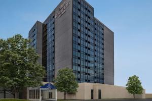 a rendering of the exterior of a building at Doubletree By Hilton Pointe Claire Montreal Airport West in Pointe-Claire