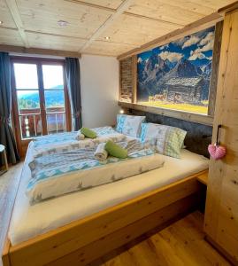 Voodi või voodid majutusasutuse Almgasthaus Glocknerblick toas