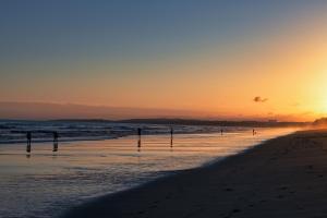 a sunset on a beach with the ocean at Domes Lake Algarve, Autograph Collection in Vilamoura +37 photos