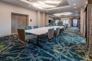 an office meeting room with a long table and chairs at Hilton Garden Inn St Augustine-Historic District in St. Augustine