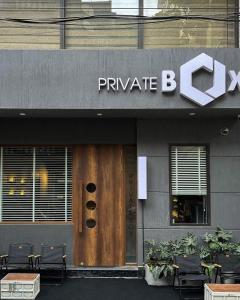 a purple byte sign on the front of a building at Lux Westlake Studio in Hanoi