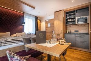 Fotografie z fotogalerie ubytování Dorfkrug Kaprun - Luxury Suites & Appartements v Kaprunu