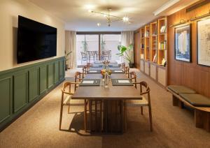 a conference room with a long table and chairs at Via Sants Hotel Barcelona, Tapestry Collection By Hilton in Barcelona