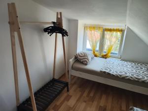 Postel nebo postele na pokoji v ubytování Apartments Ivo