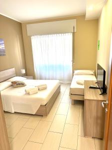 Ένα ή περισσότερα κρεβάτια σε δωμάτιο στο Grab a Flat in Coroneo