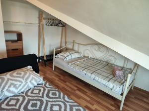 Postel nebo postele na pokoji v ubytování Apartments Ivo
