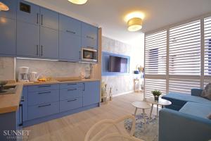 Kuchnia lub aneks kuchenny w obiekcie Sunset Apartments - Kormoran - Plaża 300m
