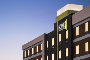 a building with a sign on the side of it at Home2 Suites By Hilton Colorado Springs I-25 Central in Colorado Springs