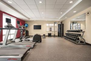 a gym with treadmills and machines in a room at Home2 Suites By Hilton Colorado Springs I-25 Central in Colorado Springs