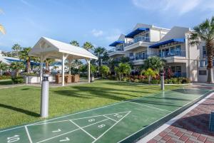 a basketball court in front of a house at Hilton Vacation Club Flamingo Beach Sint Maarten in Simpson Bay