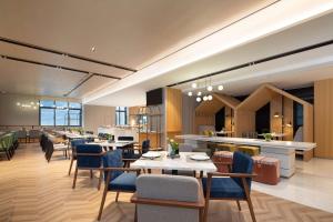 Restoran või mõni muu söögikoht majutusasutuses Hilton Garden Inn Hangzhou Xiaoshan