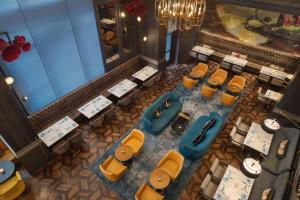 an overhead view of a restaurant with tables and chairs at Canopy by Hilton San Francisco SoMa in San Francisco